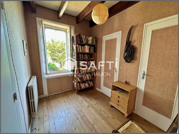 Maison à rénover en plein centre avec jardin