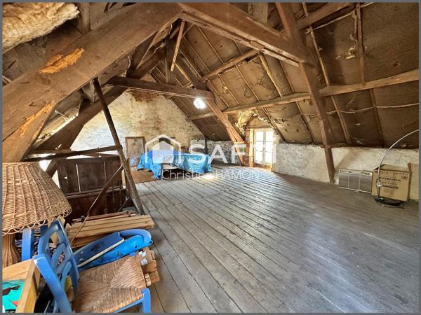 Maison à rénover en plein centre avec jardin