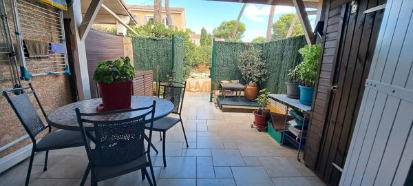 Logement avec terrasse couverte