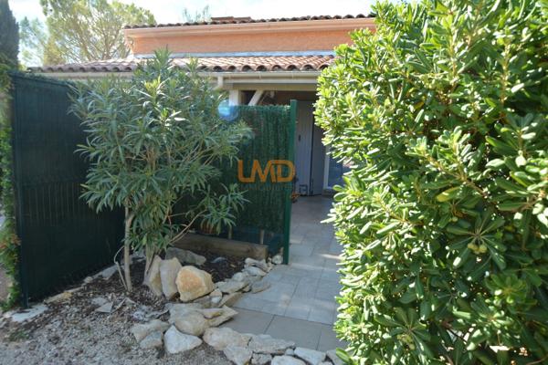 Logement avec terrasse couverte