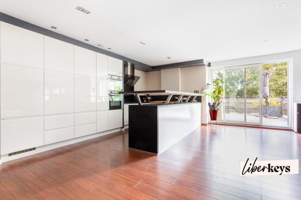 Appartement 165m² - 3 chambres - 1 parking - 1 grande terrasse