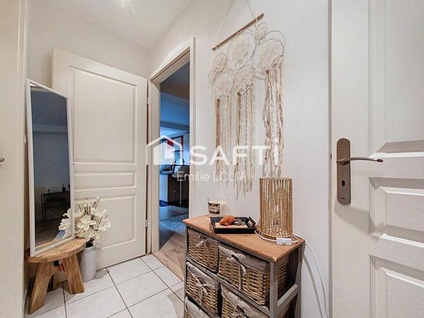 Charmant appartement RDC, 1 chambre, terrasse et parkings