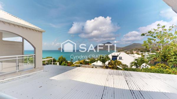 Duplex, vue mer panoramique, rocher du Diamant, femme couchée