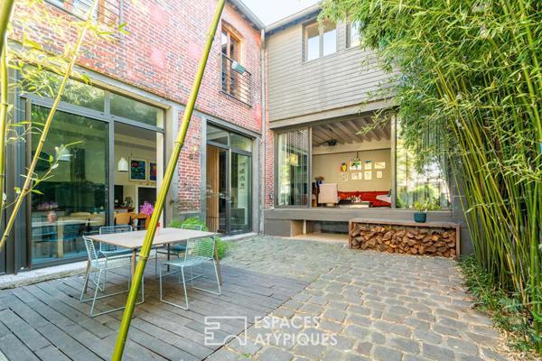 Maison à l’esprit loft avec terrasse