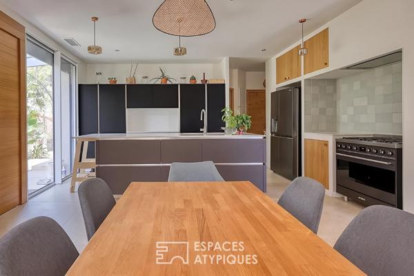 Appartement en rez de jardin avec piscine