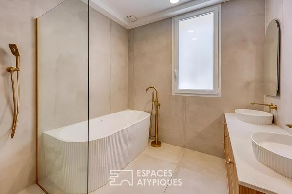 Appartement en rez de jardin avec piscine