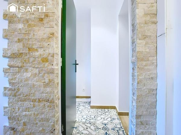 Appartement 1 pièce avec parking dans de l'ancien rénové