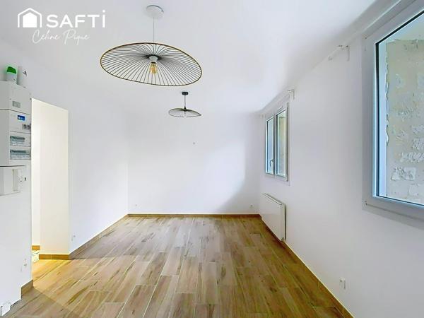 Appartement 1 pièce avec parking dans de l'ancien rénové