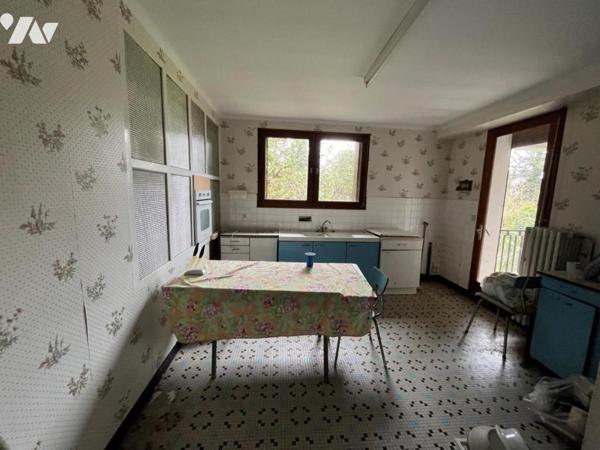 Maison à fort potentiel sur vaste terrain