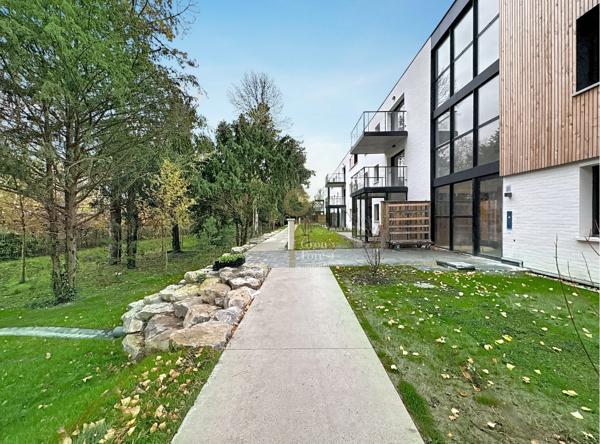 T3 de 75 m² avec balcon et stationnements sécurisés - proximité du Parc Barbieux et des transports