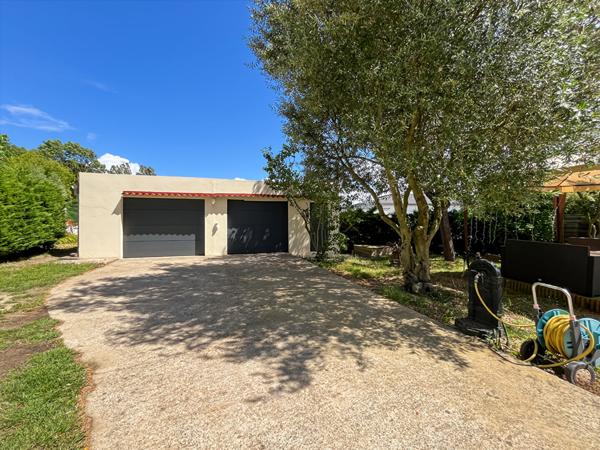 Maison de plain-pied à Palaiseau - Terrain arboré de 517 m² et double garage
