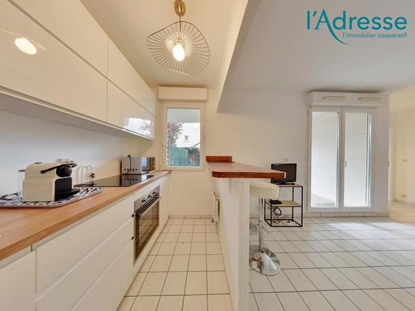 Appartement 2 pièce(s) 36 m2 avec jardinet + Box