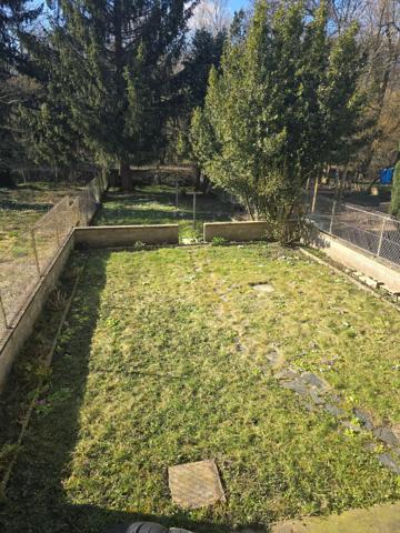 Maison accolée avec jardin