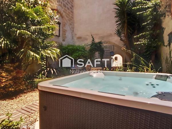 Maison de caractère de 200m² cour paysagée jacuzzi