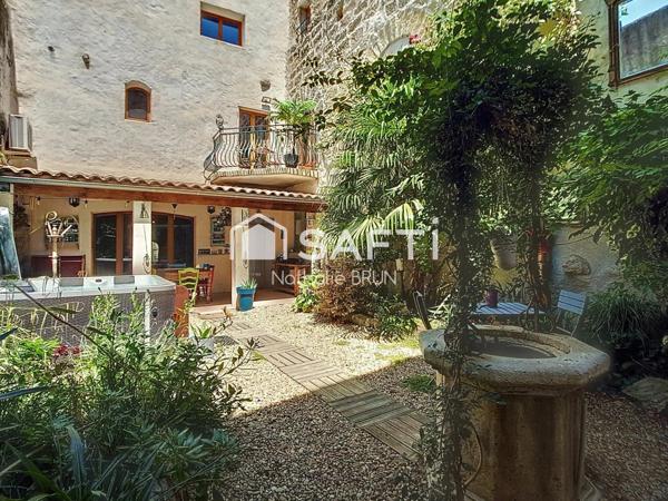 Maison de caractère de 200m² cour paysagée jacuzzi