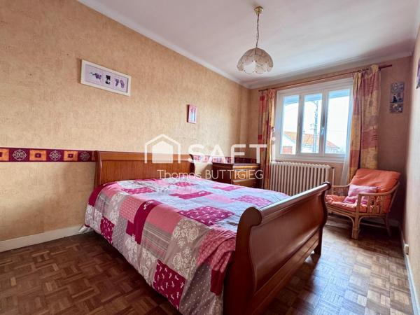 Maison 4 chambres, garage et jardin.