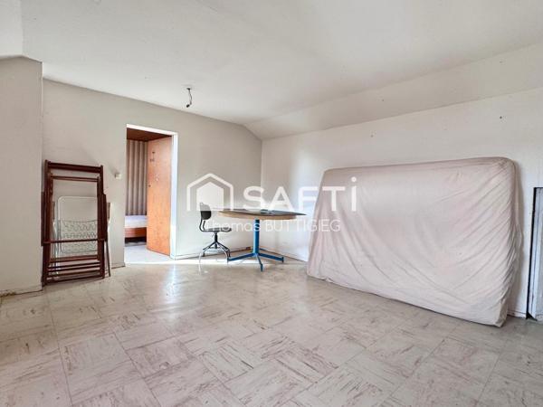 Maison 4 chambres, garage et jardin.