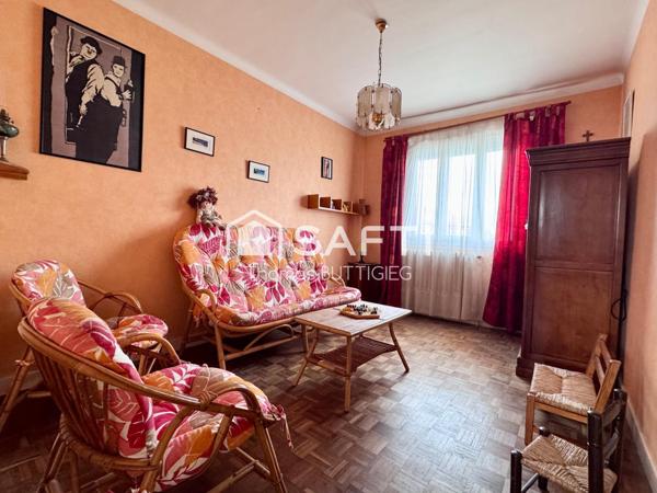 Maison 4 chambres, garage et jardin.