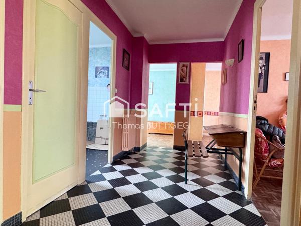 Maison 4 chambres, garage et jardin.