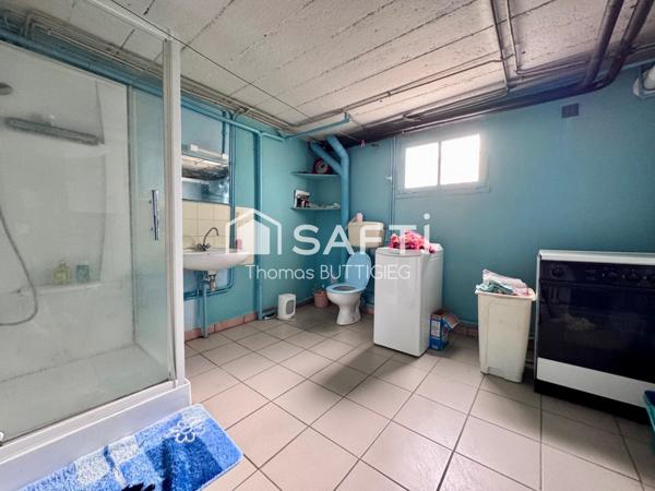 Maison 4 chambres, garage et jardin.