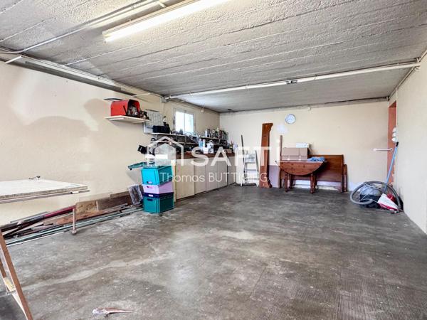 Maison 4 chambres, garage et jardin.