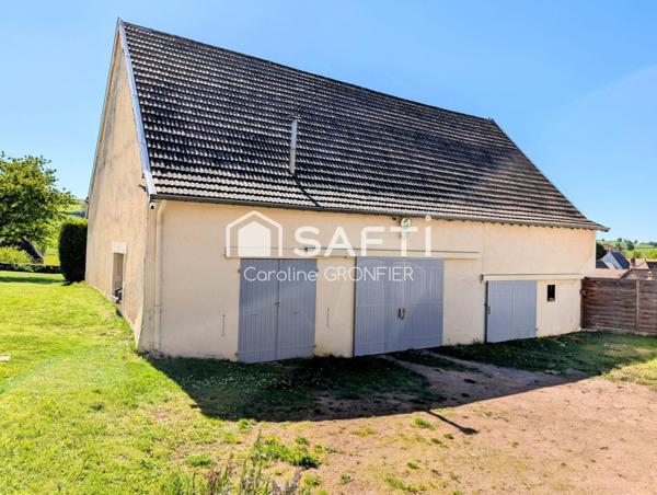 Propriété de caractère avec deux logements indépendants
