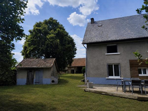 Maison avec grange, dépendances et  grand terrain