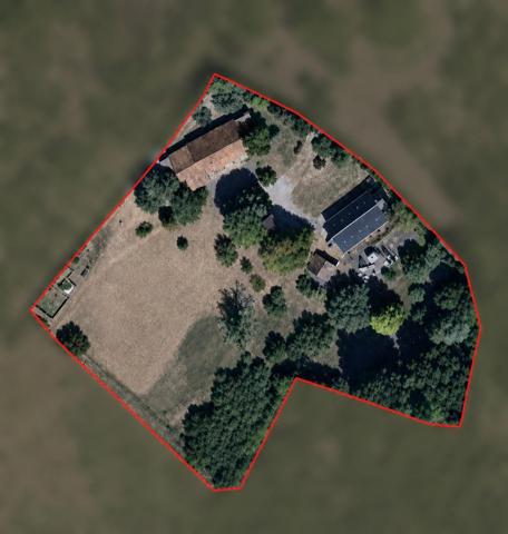 Maison avec grange, dépendances et  grand terrain
