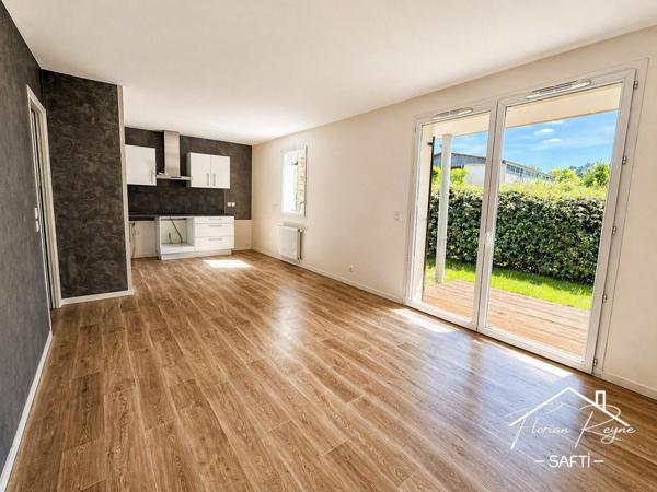 T3 avec jardin et 2 places de parking