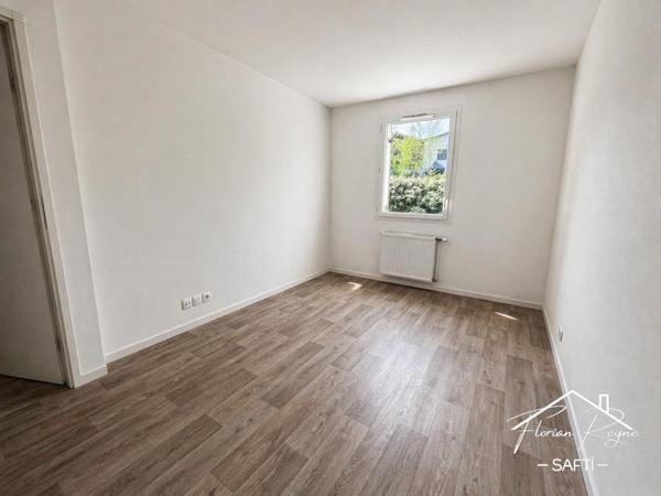 T3 avec jardin et 2 places de parking