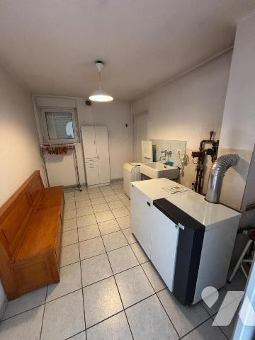 Maison 4 pièces (environ 127 m² habitables) située dans un secteur calme (en impasse)