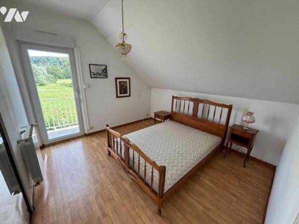 Maison 4 pièces (environ 127 m² habitables) située dans un secteur calme (en impasse)