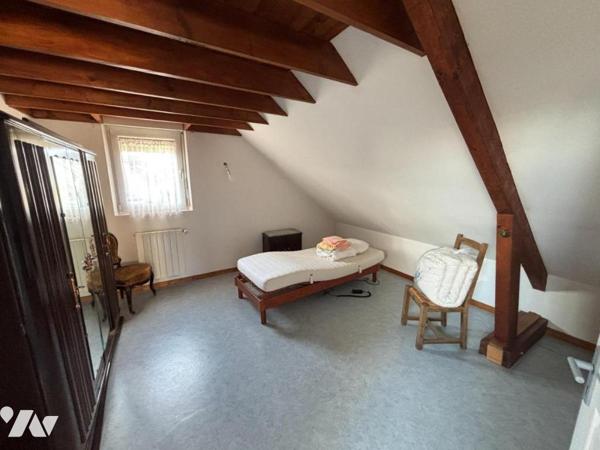 Maison 4 pièces (environ 127 m² habitables) située dans un secteur calme (en impasse)