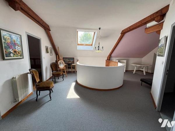 Maison 4 pièces (environ 127 m² habitables) située dans un secteur calme (en impasse)