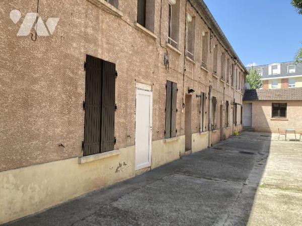 Grand F spacieux de 60m² au RDC d'une petite copro