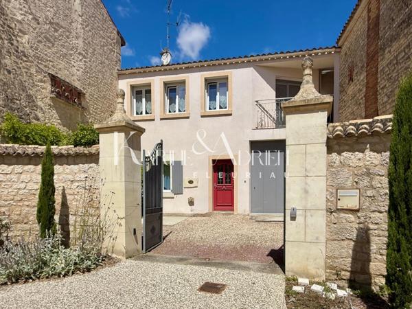 Maison de ville avec grand garage, ascenseur, 4 chambres, jardin et terrasse