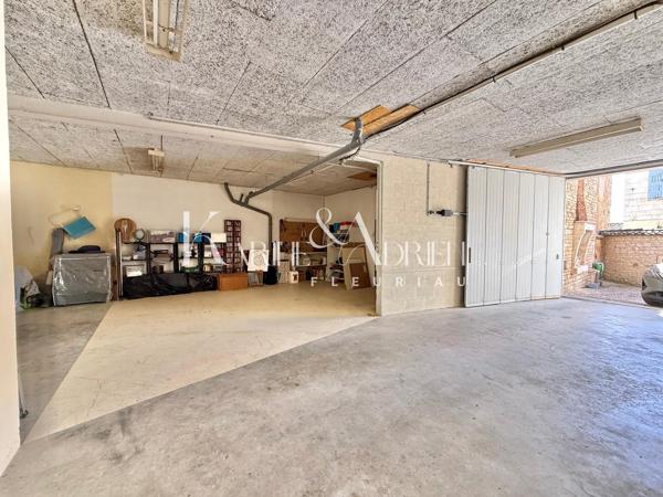 Maison de ville avec grand garage, ascenseur, 4 chambres, jardin et terrasse