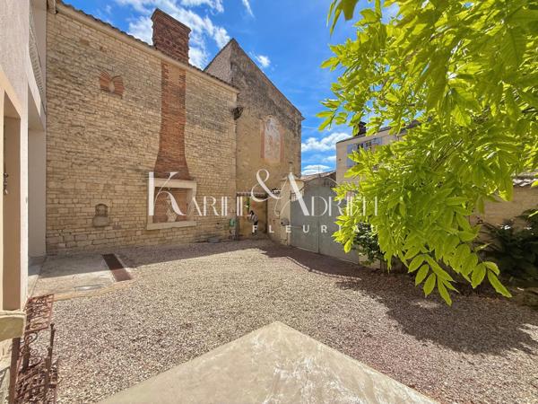 Maison de ville avec grand garage, ascenseur, 4 chambres, jardin et terrasse
