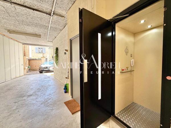 Maison de ville avec grand garage, ascenseur, 4 chambres, jardin et terrasse