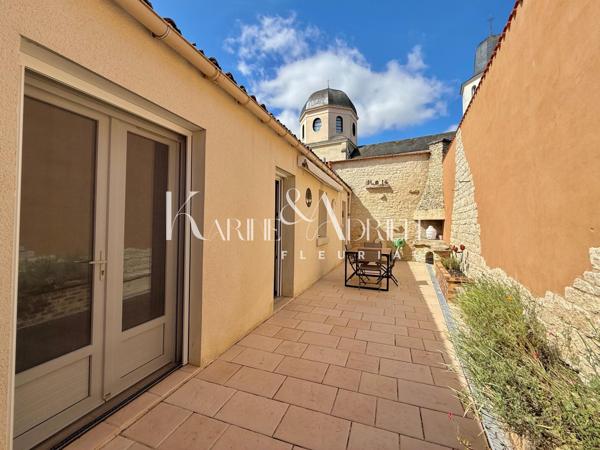 Maison de ville avec grand garage, ascenseur, 4 chambres, jardin et terrasse