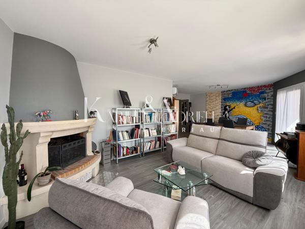 Maison de ville avec grand garage, ascenseur, 4 chambres, jardin et terrasse