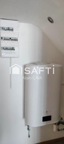Appartement de 49 m² au prier étage avec balocon et garage en indivision