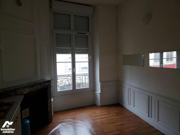 Immeuble composé de 7 appartements et un local commercial d'environ 412m².