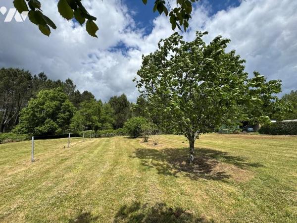 Charmante maison en pierre de plain-pied avec grand terrain constructible à Durance