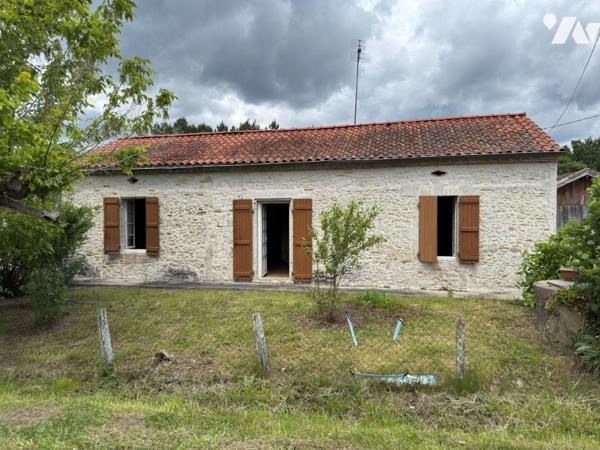 Charmante maison en pierre de plain-pied avec grand terrain constructible à Durance