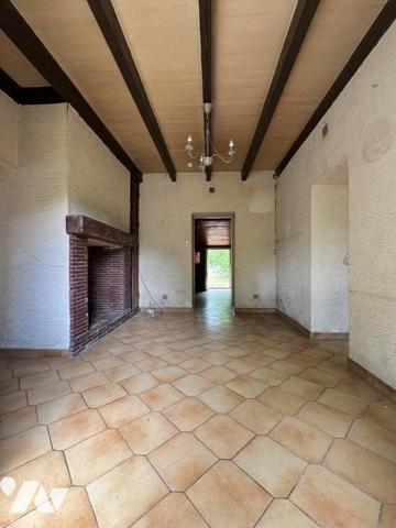 Charmante maison en pierre de plain-pied avec grand terrain constructible à Durance