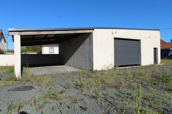 Grand garage 120 m² sur terrain de 1000 m²