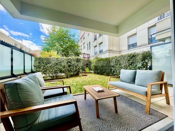 T3 de 78 m2 dans le centre ville avec jardin et parking.