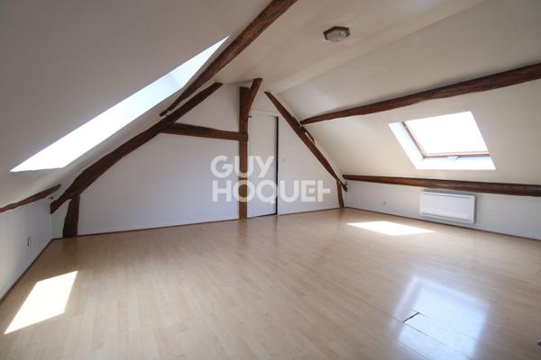 APPARTEMENT EN CENTRE-VILLE de COUBERT