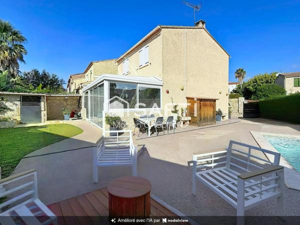 Une maison familiale cosy avec jardin et véranda, idéale pour se sentir bien chez soi !